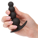 Boundless Beaded Plug held in one hand to show its size