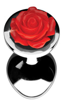 Top view of the red rose on the base of the medium metal plug