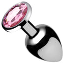 Small pink gem plug at an angle, showing the jewel base and polished bulb