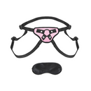 Lux Fetish Strap-On Harness in pink: pink and black adjustable strap-on harness with an O-ring front and a satin blindfold