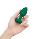 Emerald Jewel Plug held in one hand to show its size