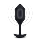 Black Vibrating Snug Plug 4 with vibration rings drawn around the weighted bulb