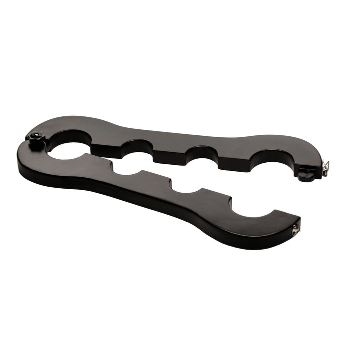 Master Series Trapped wrist and ankle stocks: black wood stockade with four holes, a hinge and a lockable clasp