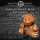 MOUTH PROPGED TEDDY KEYCHAIN