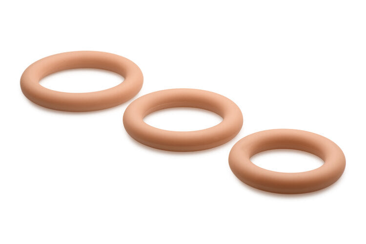 Jock Ring 3 piece set in medium tone: three stretchy silicone cock rings in graduated sizes
